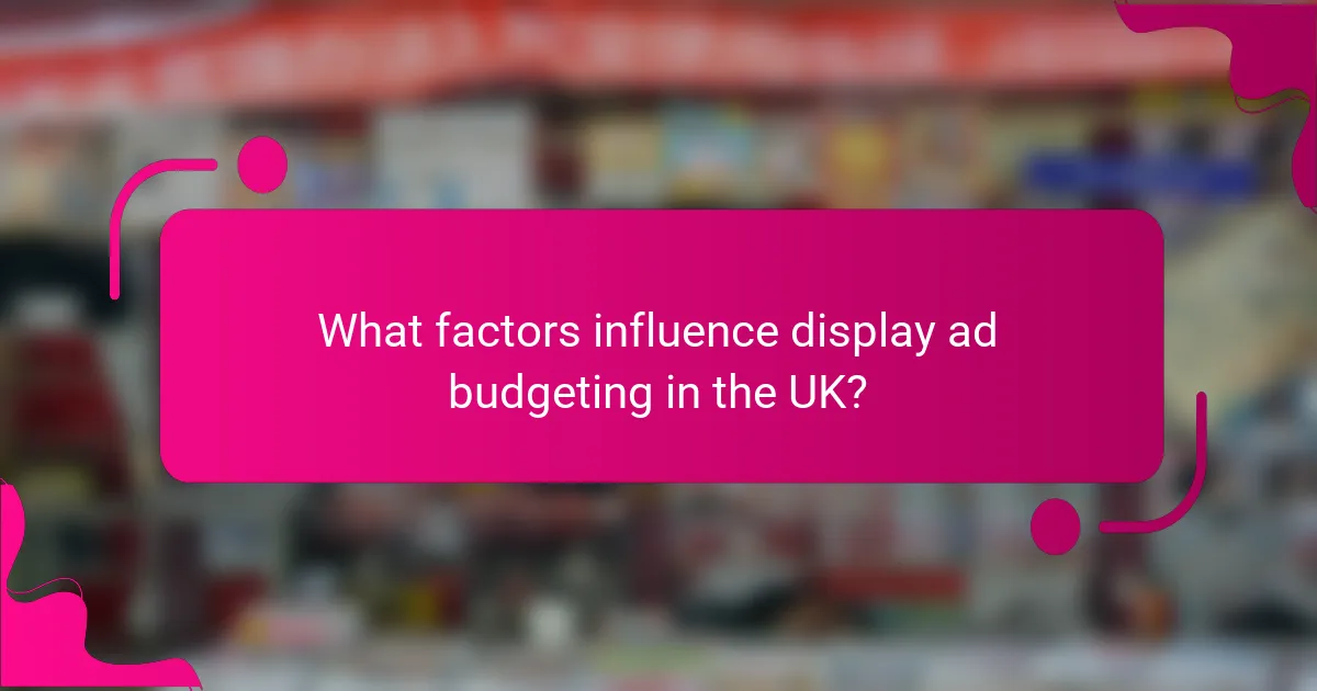 What factors influence display ad budgeting in the UK?